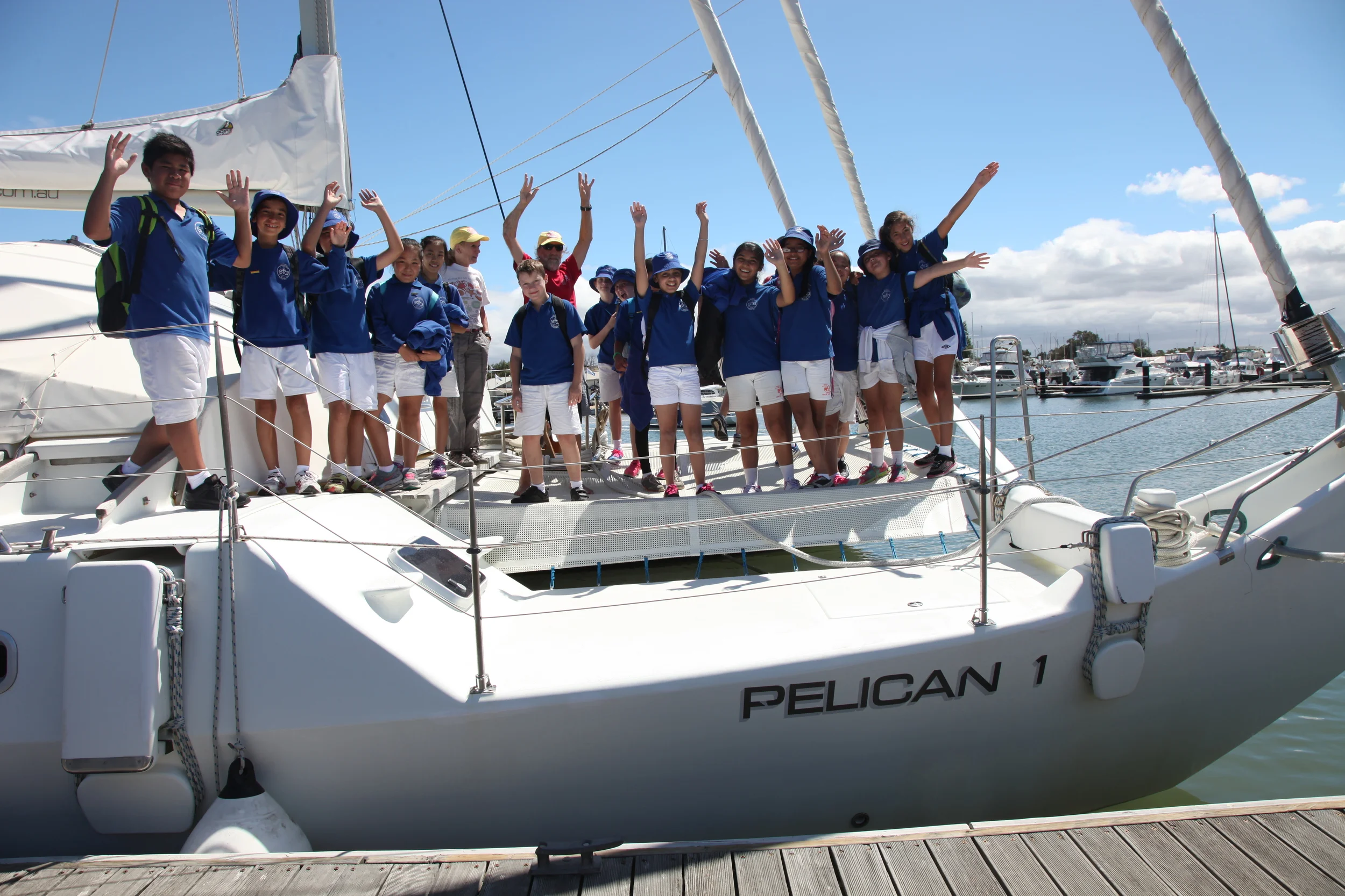 School group waving from Pelican 1